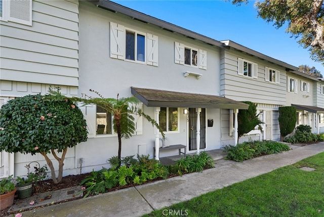 multi unit property featuring stucco siding