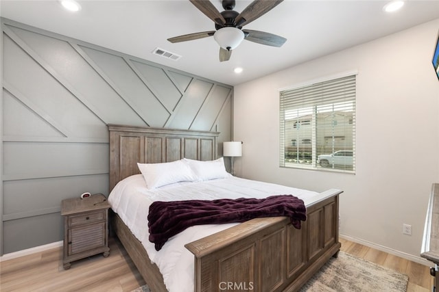 bedroom featuring recessed lighting, visible vents, light wood-style floors, and ceiling fan