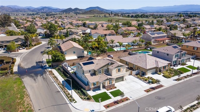 aerial view with a mountain view and a residential view