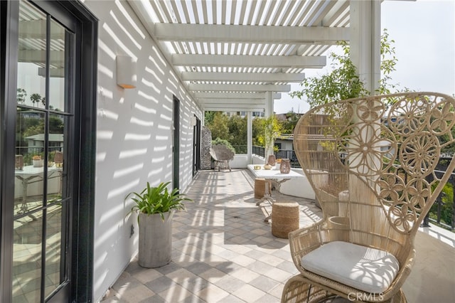 view of patio featuring a pergola