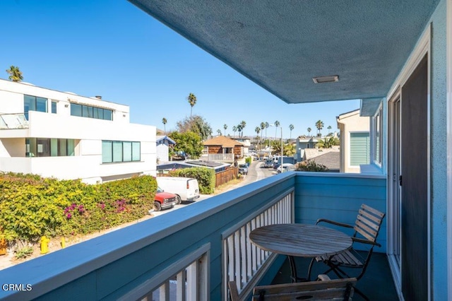 balcony featuring a residential view