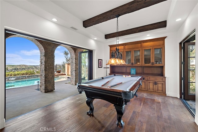 rec room with dark wood-style floors, beamed ceiling, recessed lighting, and visible vents