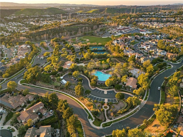 birds eye view of property with a residential view