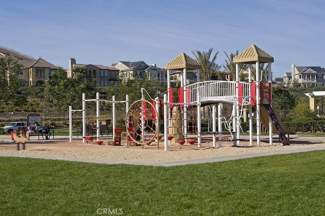 community play area with a yard