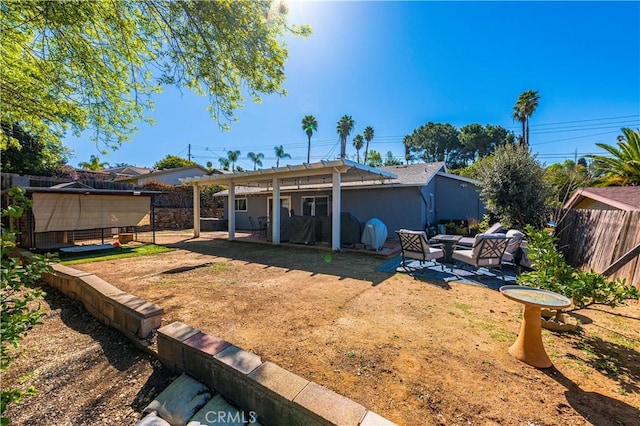 view of yard featuring a patio and fence