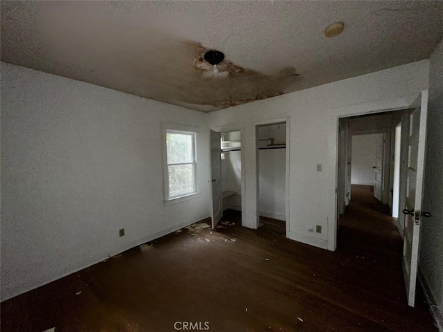 unfurnished bedroom featuring wood finished floors