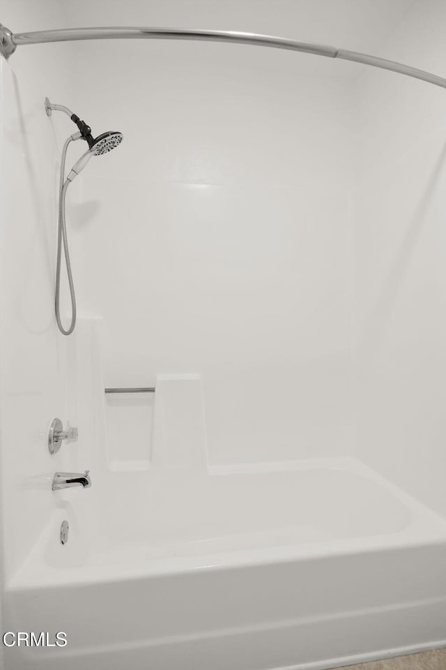 full bathroom featuring shower / bath combination