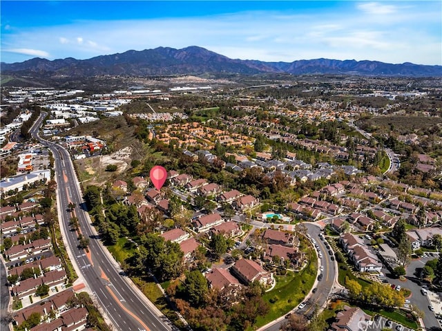 drone / aerial view with a mountain view and a residential view