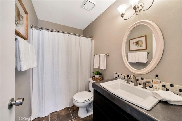 full bath featuring vanity, a shower with shower curtain, toilet, and tile patterned floors