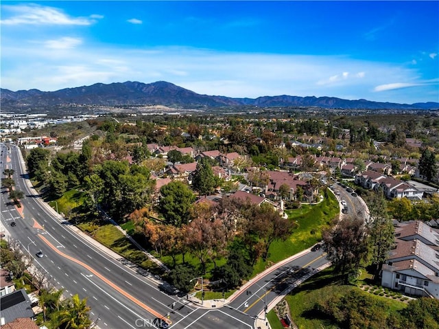 birds eye view of property with a residential view and a mountain view