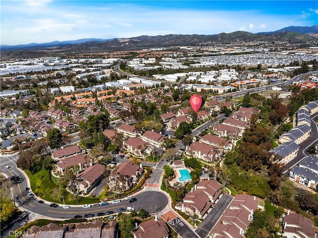 drone / aerial view with a mountain view and a residential view