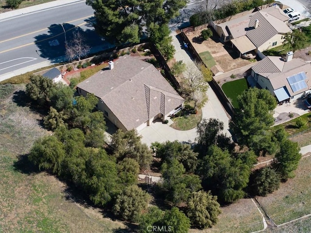 birds eye view of property with a residential view