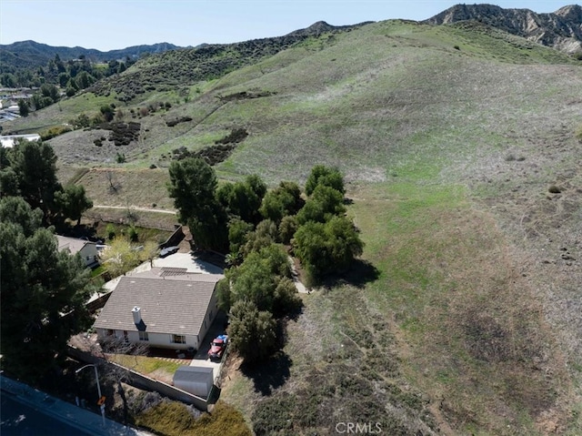 drone / aerial view featuring a mountain view