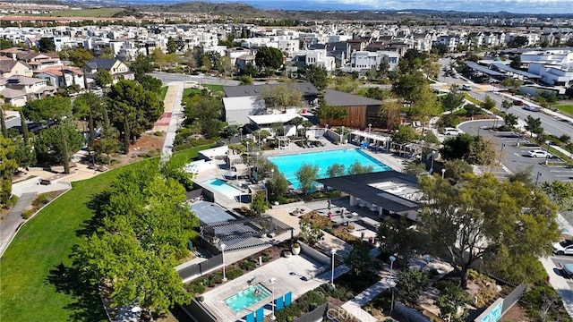 birds eye view of property with a residential view