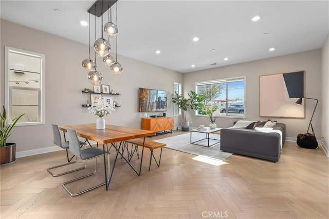 dining area with recessed lighting and baseboards