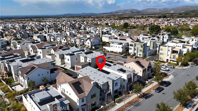 birds eye view of property featuring a residential view and a mountain view