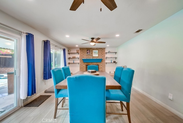 dining space with recessed lighting, baseboards, visible vents, and wood tiled floor