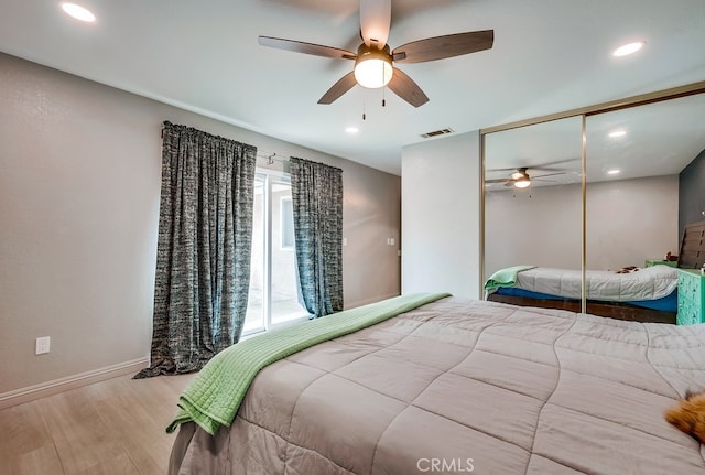 bedroom with recessed lighting, visible vents, wood finished floors, and a ceiling fan