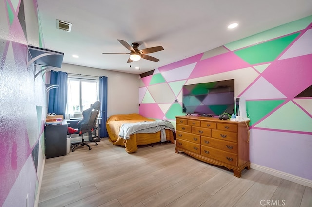 bedroom featuring recessed lighting, visible vents, baseboards, and wood finished floors