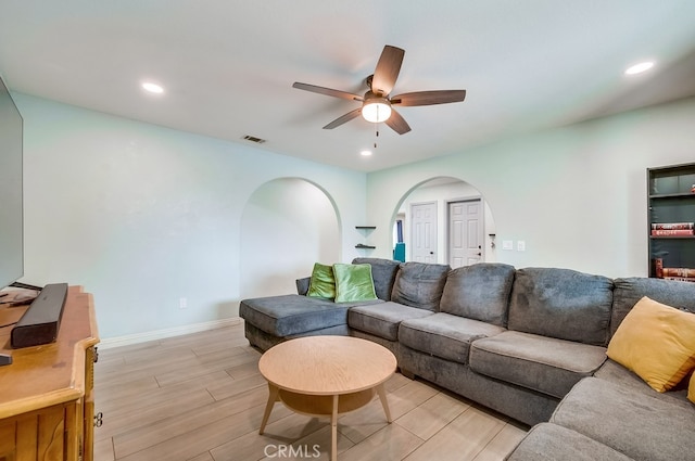 living area featuring visible vents, recessed lighting, a ceiling fan, and wood finish floors