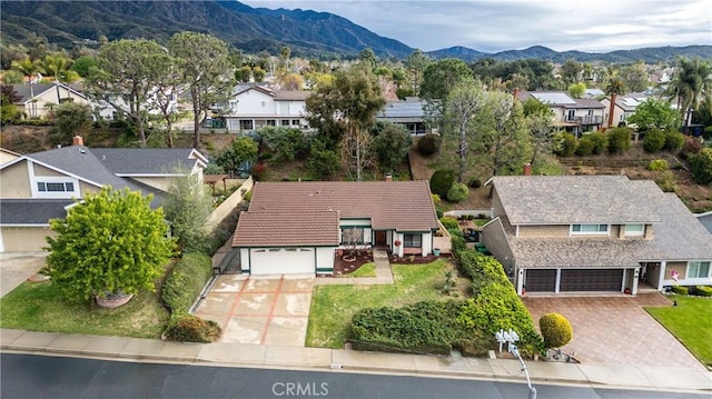 bird's eye view featuring a mountain view and a residential view