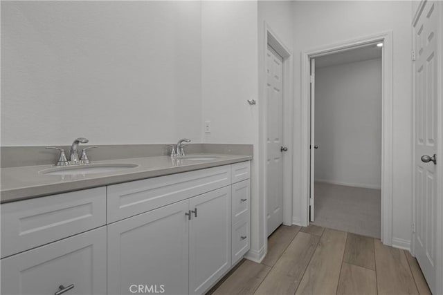 19781 Lurin Ave, Riverside, CA 92508 - bathroom featuring wood finished floors and double vanity