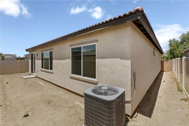 19781 Lurin Ave, Riverside, CA 92508 - view of side of home featuring central AC unit and stucco siding