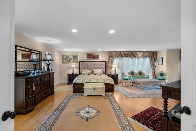 bedroom featuring recessed lighting, baseboards, and light wood-style flooring