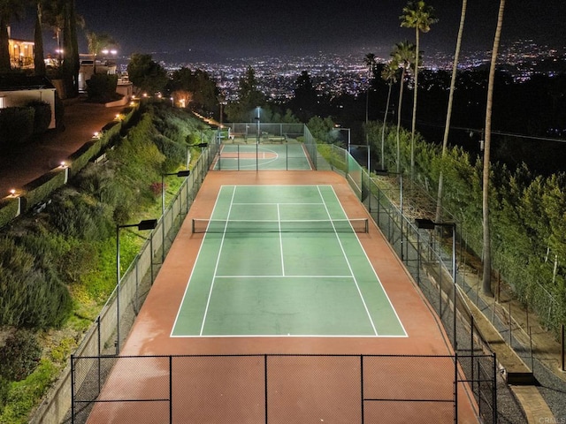 view of sport court with community basketball court and fence