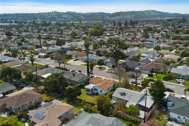 drone / aerial view with a mountain view and a residential view