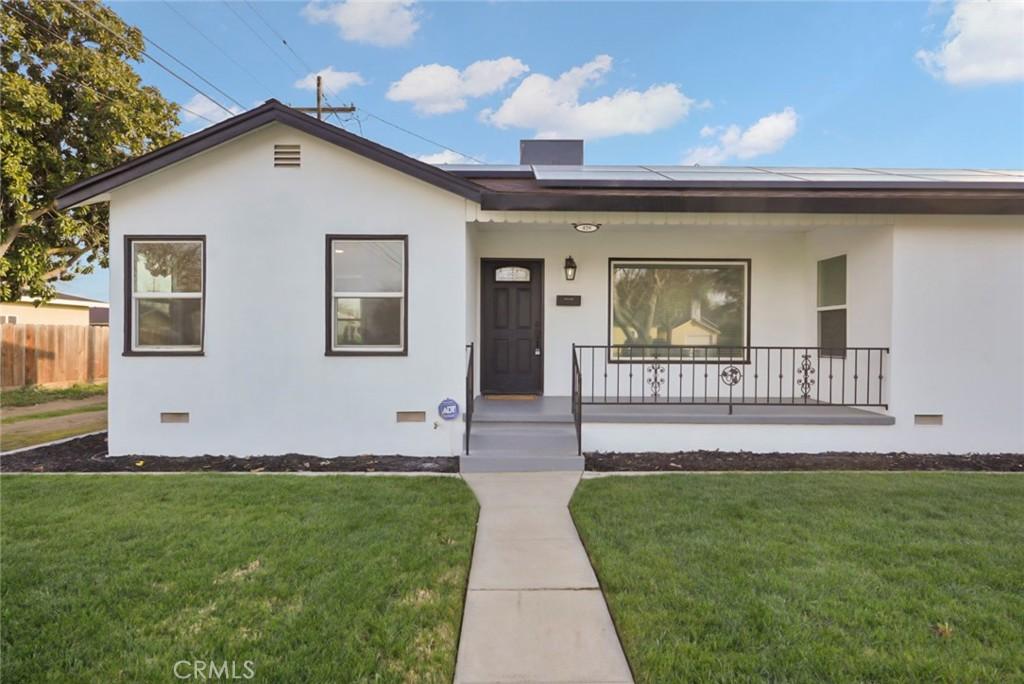 420 N 3rd St, Chowchilla, CA 93610 - ranch-style home with stucco siding, covered porch, and crawl space