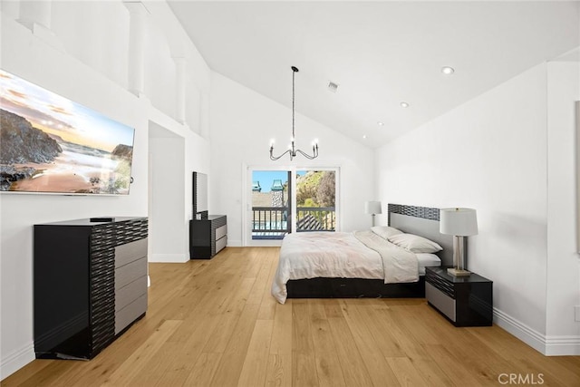 bedroom with light wood-type flooring, visible vents, high vaulted ceiling, access to outside, and baseboards