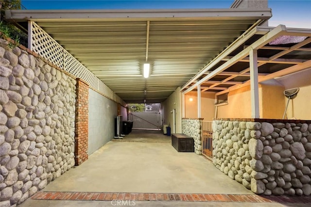 view of car parking featuring an attached carport