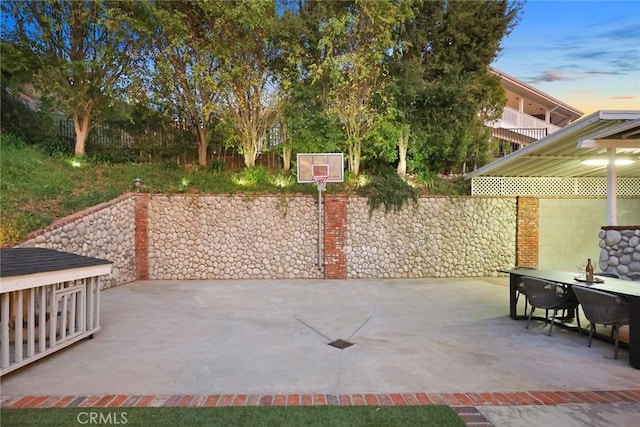 view of patio / terrace with outdoor dining space and fence