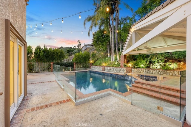 view of swimming pool featuring a patio area, a fenced in pool, a gazebo, and fence