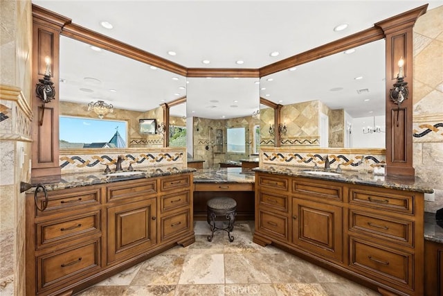 bathroom with tile walls, two vanities, and a sink