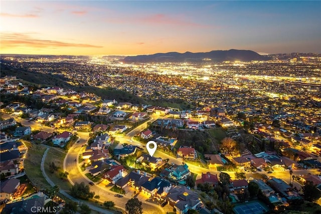 drone / aerial view with a mountain view and a residential view