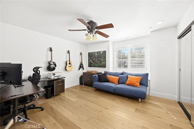 office area featuring light wood-style flooring, recessed lighting, baseboards, and ceiling fan