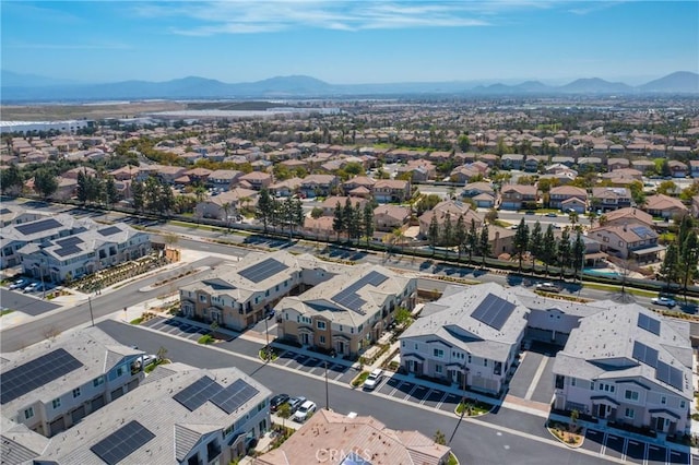 birds eye view of property featuring a mountain view and a residential view