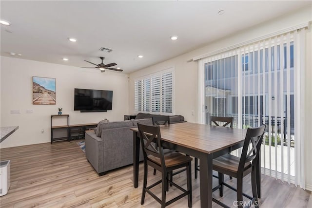 dining room featuring visible vents, recessed lighting, light wood-style floors, and ceiling fan