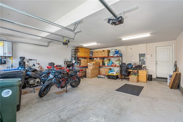 garage featuring electric panel and a garage door opener