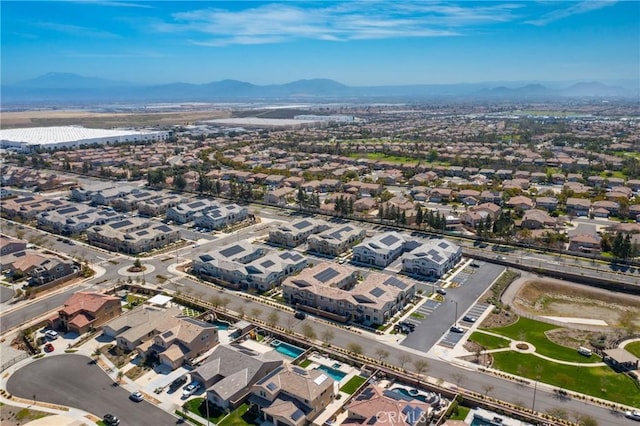 aerial view featuring a mountain view and a residential view