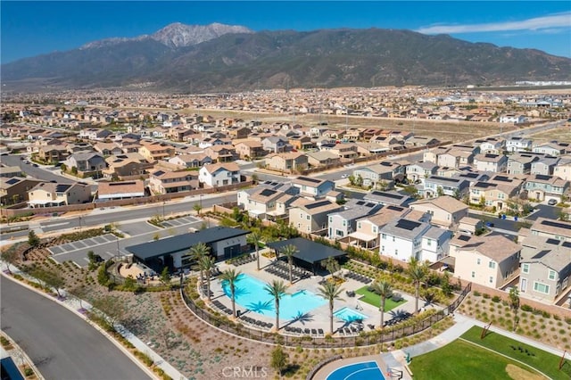 birds eye view of property featuring a mountain view and a residential view