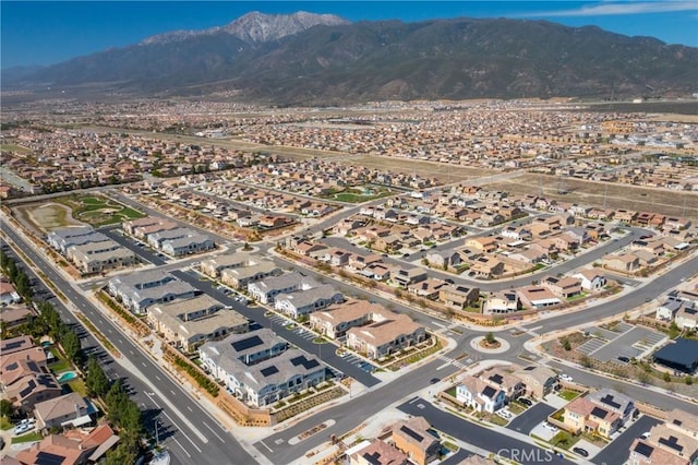 aerial view with a mountain view and a residential view