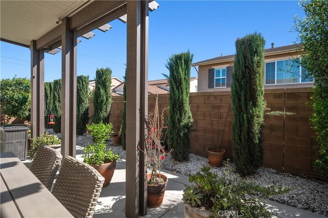 view of patio / terrace with fence