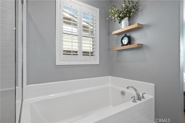 full bathroom featuring a garden tub