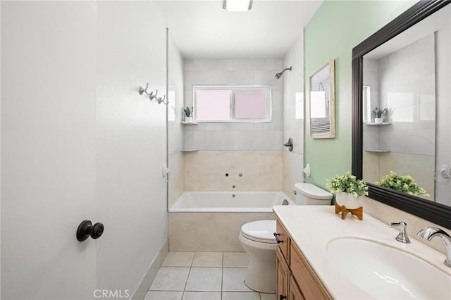 bathroom with vanity, tile patterned floors, toilet, and shower / tub combination