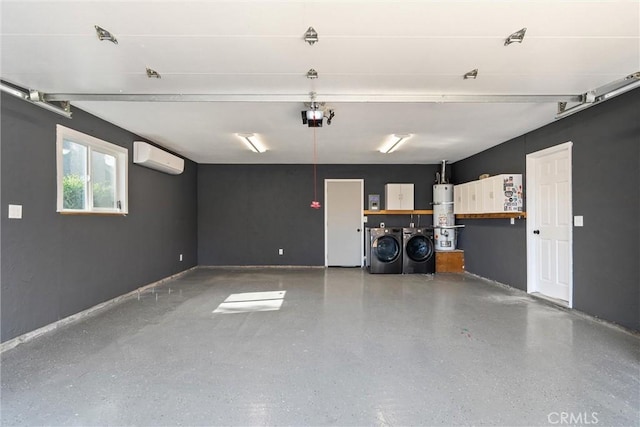 garage with an AC wall unit, a garage door opener, water heater, separate washer and dryer, and baseboards