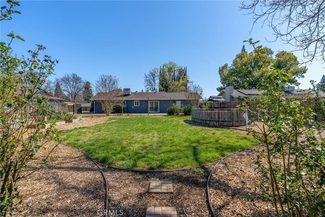 view of yard with fence