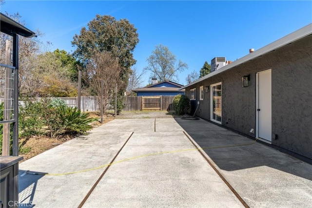 view of patio / terrace featuring central AC unit and a fenced backyard